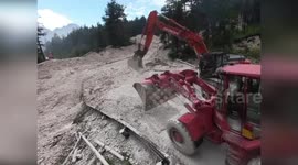 Italy: Massive Landslide Blocks SS 51 Road In Belluno Firefighters Work Through The Night