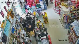 Hero shopkeeper saves baby rolling down steps in stroller