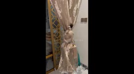 Pet cat sleeps in hilarious awkward position tangled in curtains