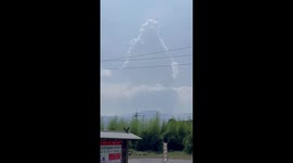 Japan's Shinmoedake volcano erupts, sending ash plume towering into sky