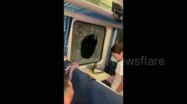 Passenger smashes window for air after 3-hour delay in 38C heat following train collision in China