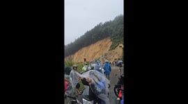 Landslide crashes onto mountain road killing driver in Vietnam