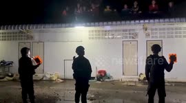 Thais flee across rooftops amid border dispute as they leave Cambodia