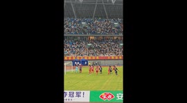 Blue team scores with bicycle kick during football match in Jiangsu, China