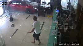 Driver mistakes gas for brakes and smashes into hotel lobby in China