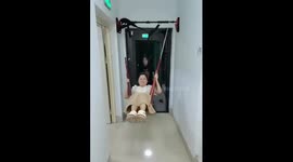 Improvised swing slips from workout bar in Hubei, China