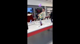 Father uses baby to play keepy-uppy with balloon