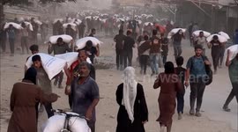 Palestinians risk lives to access scarce humanitarian aid amid Israeli attacks