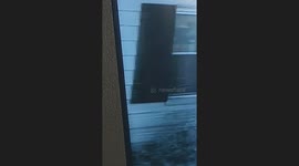 This was recorded a few days ago frome my living room me and my wife was sitting there eating a sandwich and she happened to glance over at the TV monitor and saw these beings faces in are windows so I grabbed my phone and hit recorded and this is what I