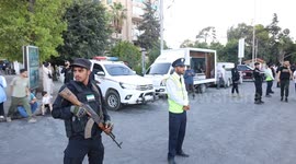 Syria: Armed security forces stand guard at a checkpoint near Saadallah al-Jabri Square
