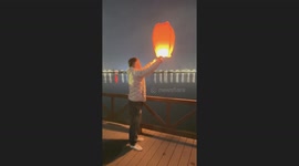 Bachelor releases lantern to wish for girlfriend... only for it to nearly fall into lake