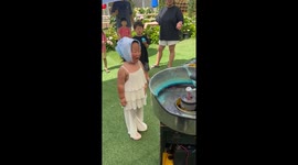 Little girl gets face covered in cotton candy in hilarious scene