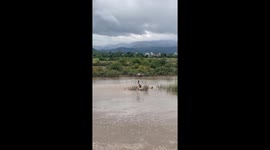 Drone rescues children stuck in flood by hoisting them to safety