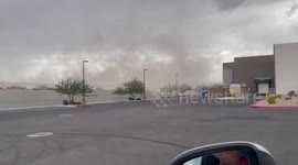 Dust storm blows away bins as it sweeps through Las Vegas