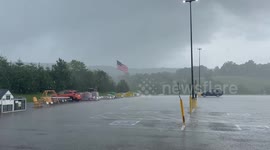 Snow and rain fall over parking lot in Livingston, Tennessee, USA