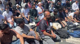 Palestine Action supporters perform prayer outside court in London