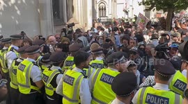 Palestine Action supporters clash with police outside court in London