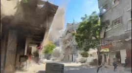MOMENT – Israeli bomb hits residential building in Gaza’s Bureij camp