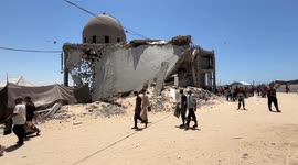 Gazans perform Friday prayer atop rubble of damaged mosque, destroyed by Israel