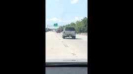 SUV Bounces Down Nola Road