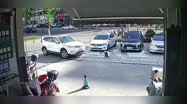 China: Boy Run Over And Trapped Under Car Outside Hotel In Shocking Incident