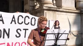 Climate activists climb building in Italy to protest against war