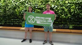 US: Climate activists target Apple Store in NYC with protest