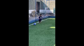 Boy trips over ball in football mishap in Duque de Caxias, Brazil