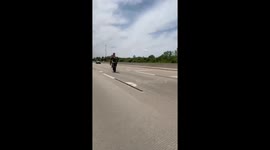Stunt Rider Crashes Bike on Highway