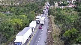 Out-of-control lorry rams car off bridge and smashes into other vehicles