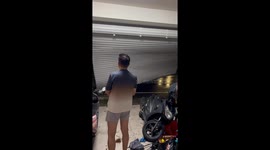 Storm tears down steel gate during Typhoon Danas in Taiwan