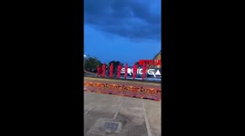Guards in red boiler suits test deadly Squid Game jump rope replica in Bangkok