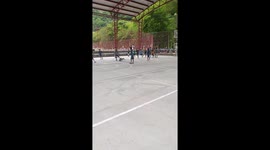 Dog scores goal during kids' football game in Dabeiba, Colombia