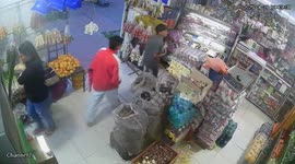 Girl in roller skates knocked over by sack of potatoes in Bogotá, Colombia