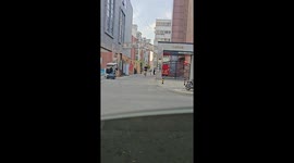 Man slips while dodging motorcycle in Shandong, China