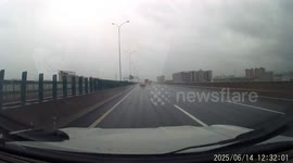 Rainy highway crash caught on dashcam in Guangdong, China
