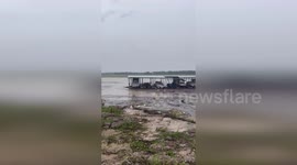Floating Docks With Boats Drift Down Lake Travis As Floodwaters Surge In Texas