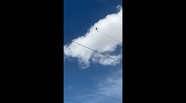 Drone caught spinning on wire near wind turbines in Gansu, China