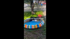 Dad on duty… barely: Hungover father spotted ‘surviving’ in toddler pool