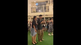 Foreign students enjoy playing traditional Filipino pinata-style game