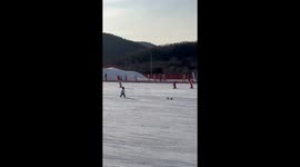 A Child Chases the Snowboard