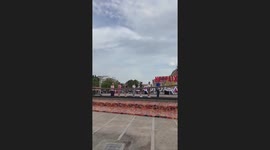 Player tossed to the ground while trying giant Squid Game replica