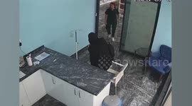 Hero vet runs back into earthquake to save stricken pooch
