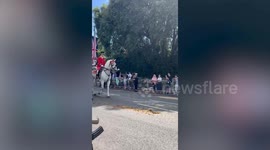 King Charles and President Macron parade through Windsor during state visit