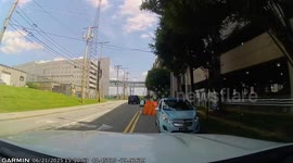 Oblivious Driver Pushes Parking Barrier With SUV