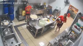 Waitress slips on wet kitchen floor in Guangdong, Guangzhou, China