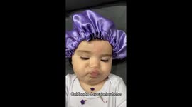 Baby in a Satin Cap