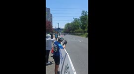 Cyclist crashes on road after losing balance during a race in China
