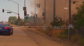 Firefighters and Helicopters Battle 20 Acre