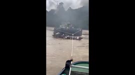 Passengers leap into river when coal barge hits wooden boat taxi